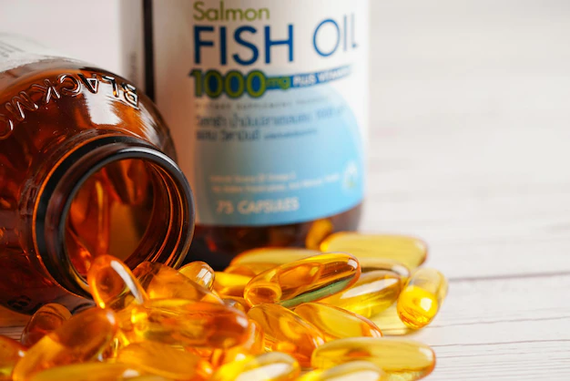 Fish oil or cod liver oil gel in capsules with omega 3 vitamins supplementary healthy food