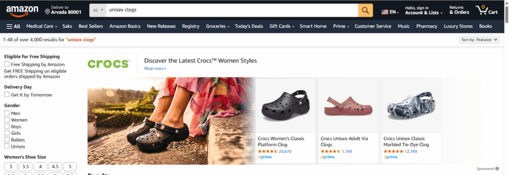 Amazon search results for “unisex clogs” showing a Crocs banner ad